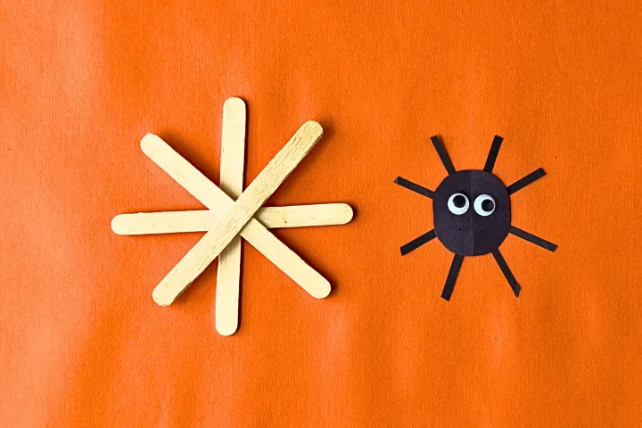 This DIY popsicle stick spider web craft is a fun preschool Halloween crat for kids. Made using 3 simple supplies, perfect for Halloween spider activities.