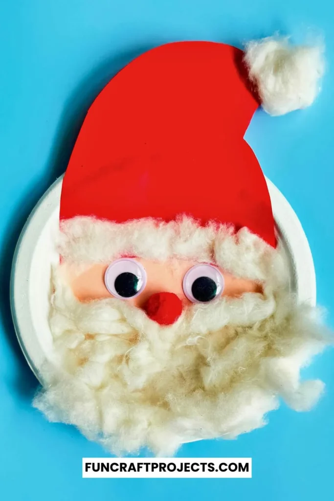 This Paper Plate Santa Craft for kids is perfect for all. This Santa Claus with paper plates is made using googly eyes, cotton balls, and construction paper. 