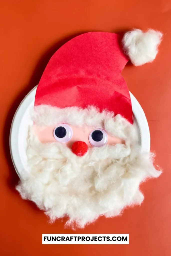 This Paper Plate Santa Craft for kids is perfect for all. This Santa Claus with paper plates is made using googly eyes, cotton balls, and construction paper. 