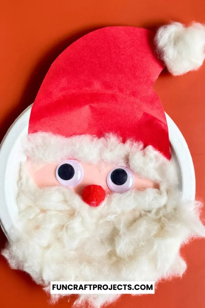 This Paper Plate Santa Craft for kids is perfect for all. This Santa Claus with paper plates is made using googly eyes, cotton balls, and construction paper. 