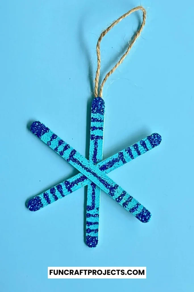 Want to use snowflakes to decorate your Christmas decorations, then here I have a DIY Popsicle Stick Snowflake Ornament craft for you.