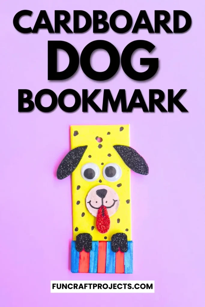 Cardboard Dog Bookmark Craft is a dog-themed bookmark made from yellow cardboard, featuring black glitter ears, googly eyes, and a red tongue, with a striped blue and red collar.