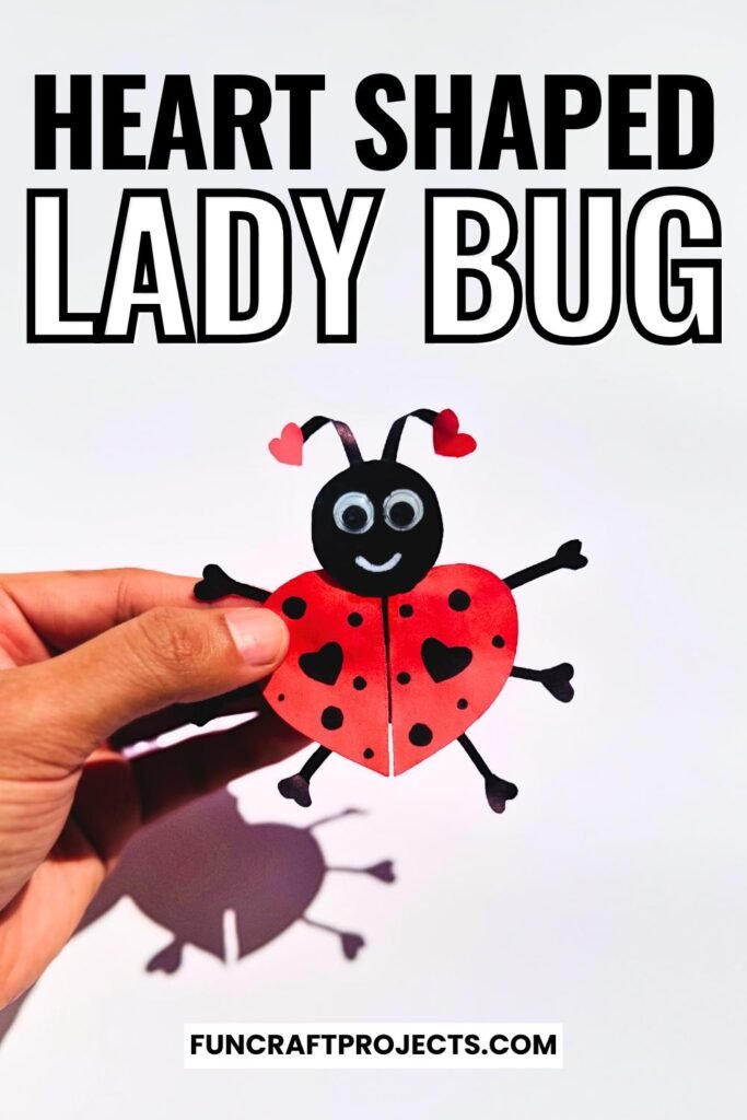 Heart Shaped Ladybug Craft made with red and black construction paper, googly eyes, and heart-shaped wings is a fun Valentine’s Day craft for kids.